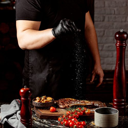 fried meat with potato and tomatoes